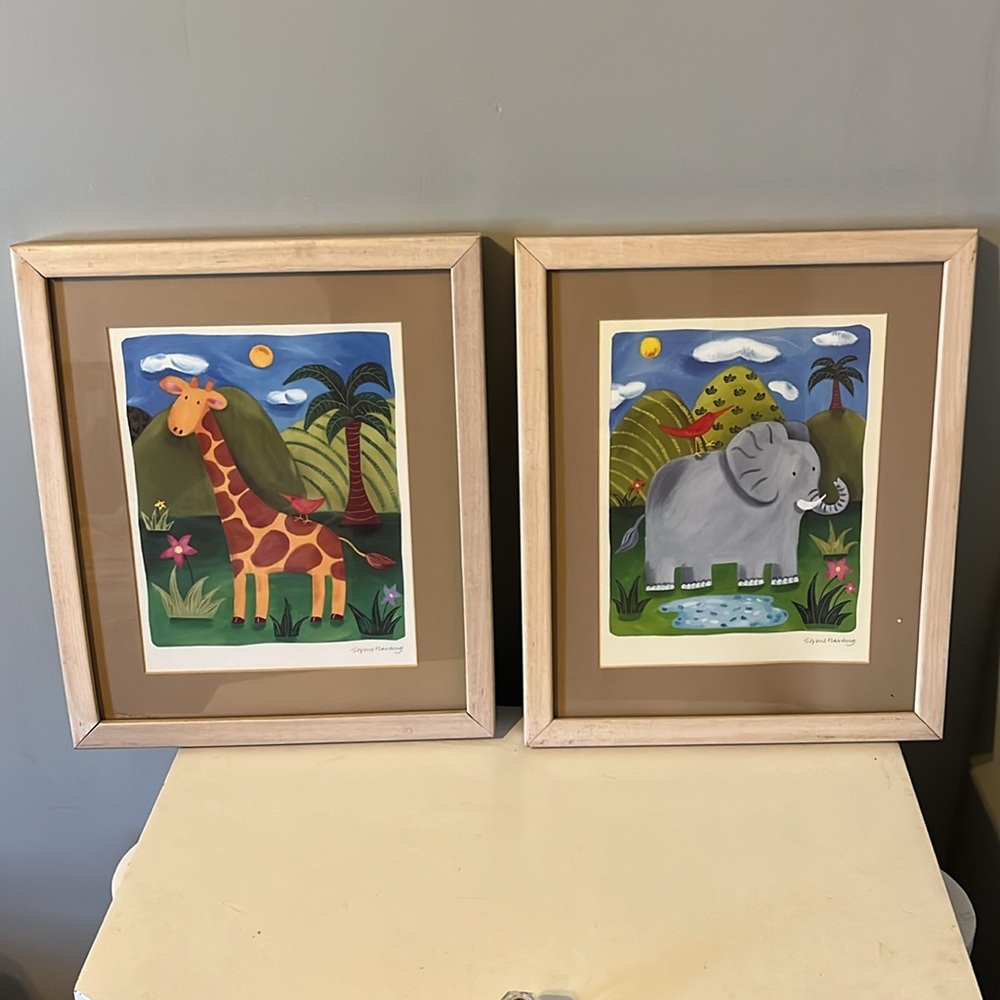 Pair of animal framed prints